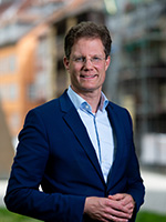 Ein Portrait des Geschäftsführers Dr. Jörn Grothe